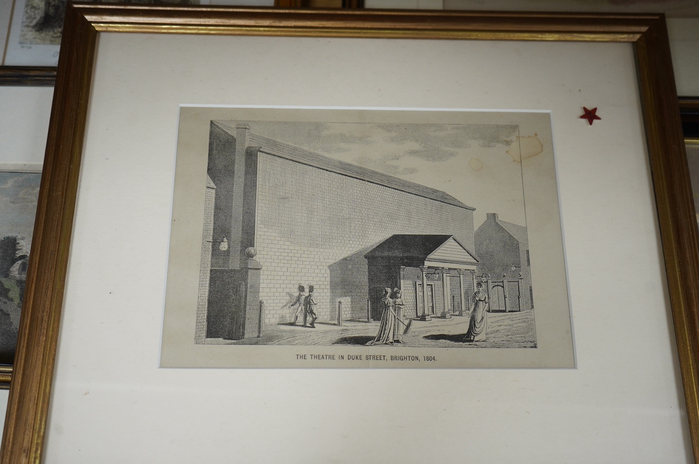 A collection of Brighton prints and engravings to include Mahomeds Baths, Brighton and London Safety Coach, St Nicholas Church and The Block House, largest 20 x 21cm, (12), together with postcard album, mostly Brighton s